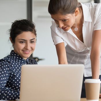 A Patelco home loan consultant helps a member prepare to buy a new home.