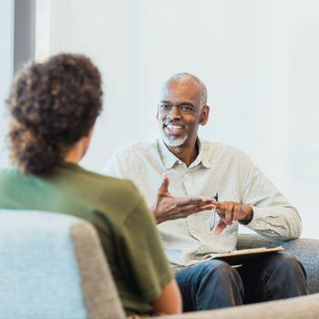 A financial specialist meets with a Patelco member.